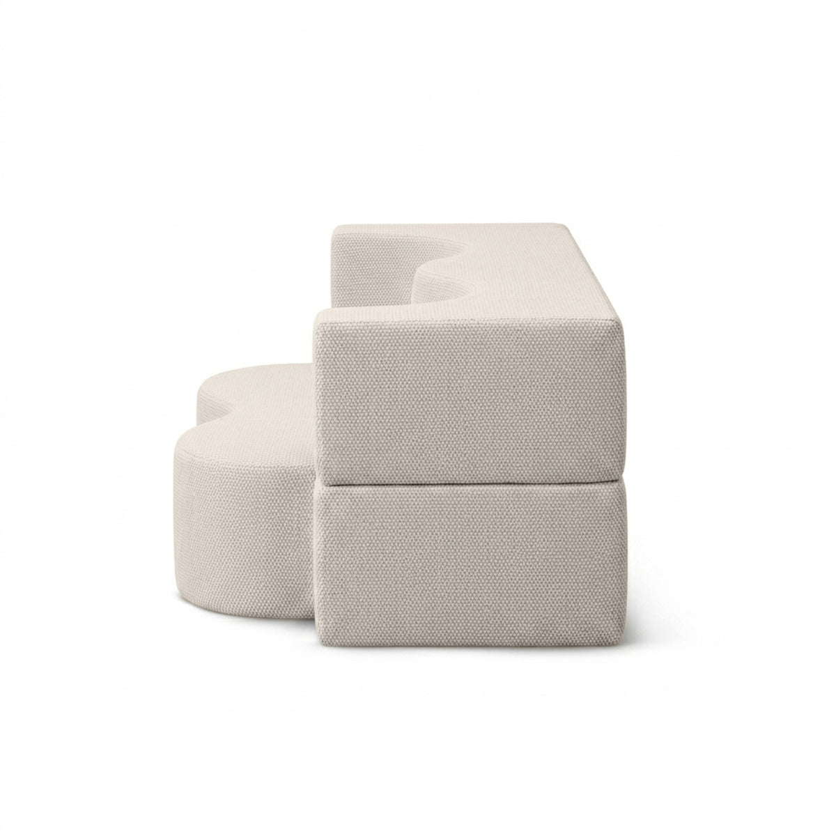 Kamelia Outdoor Foam Sofa Bed in Modern Style with Organic Form in Harris Outdoor Fabric – side view