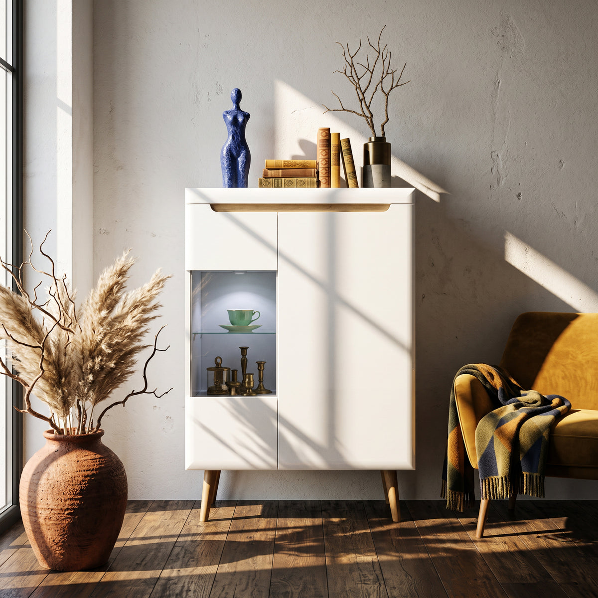 Trava living room display cabinet with glass front 90x134 cm in Scandinavian style – interior setting