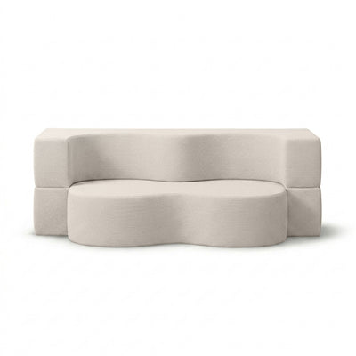 Kamelia Outdoor Foam Sofa Bed in Modern Style with Organic Form in Harris Outdoor Fabric – front view