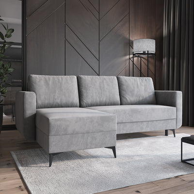 Canapé d'angle Forra Gris Acier (MANILA 16) dans un salon moderne avec un tapis et une lampe, chaise longue à gauche