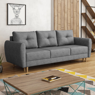 Canapé Harmi 235 cm dans un salon avec une bibliothèque en bois et une table basse – canapé convertible de style scandinave