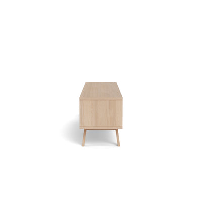Meuble TV Lurisse 180 x 50, chêne blanchi – vue de profil, meuble TV bas sur des pieds légèrement inclinés