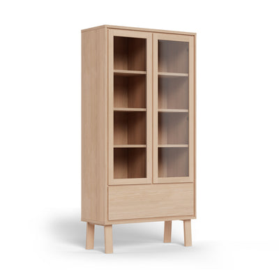 Vitrine Lurisse 90 x 180 en chêne blanchi, avec deux portes vitrées et un tiroir – vitrine de salon, vue de profil